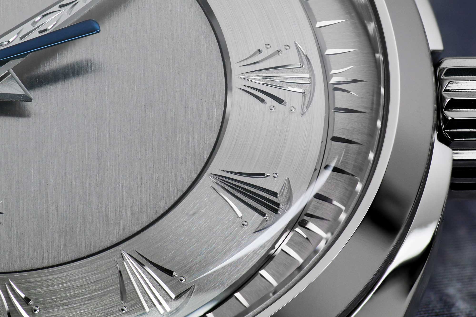 Grand Seiko SBGW263 macro of ornate engraved dial.