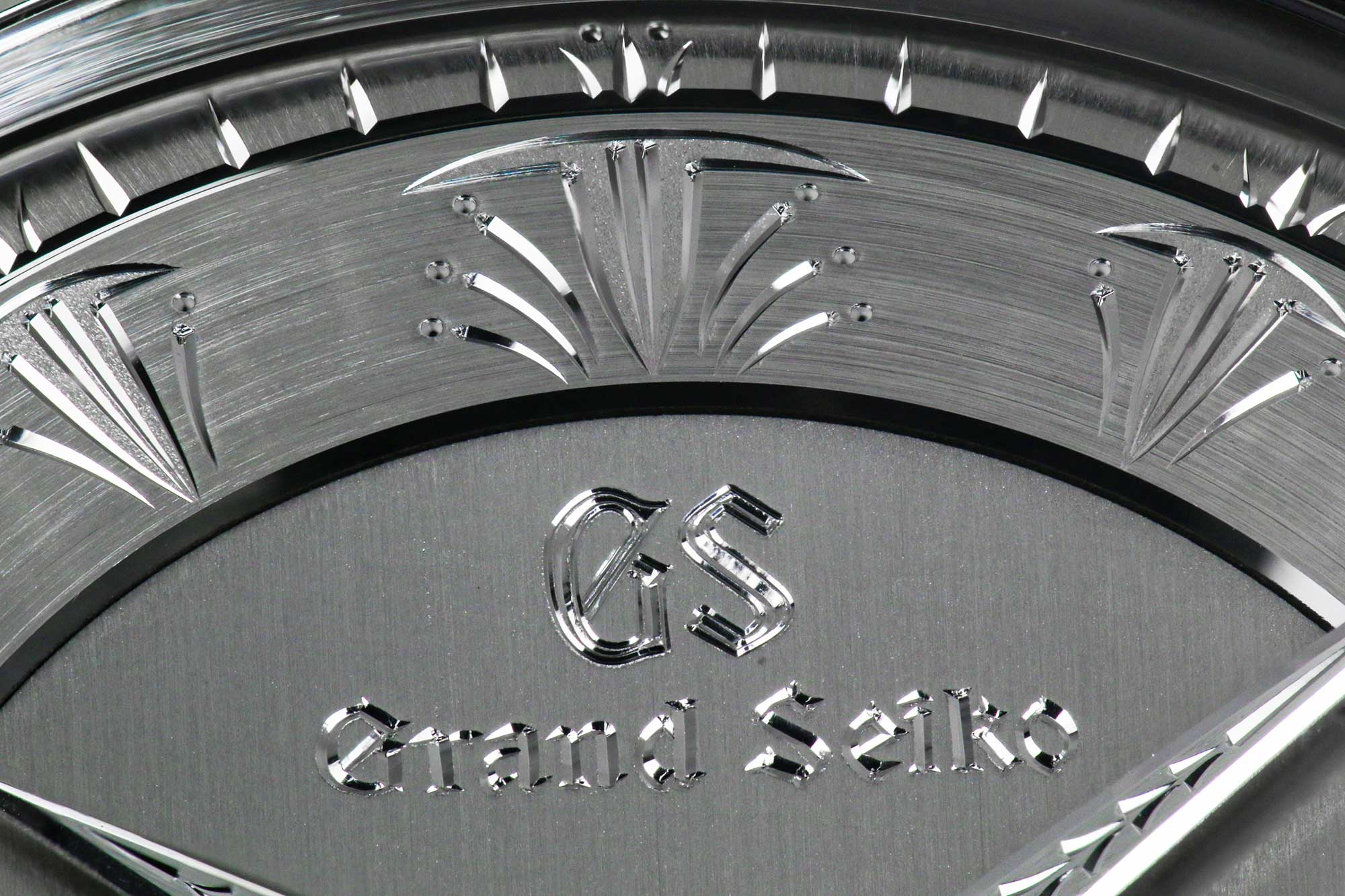Grand Seiko SBGW263 macro of ornate engraved dial.