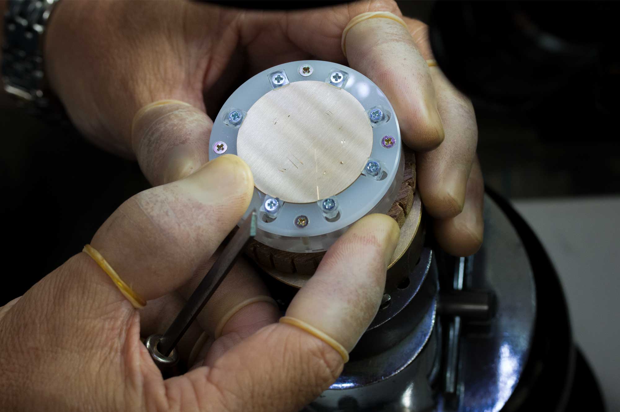 Master engraver showing off the detail of the hand engraving work.