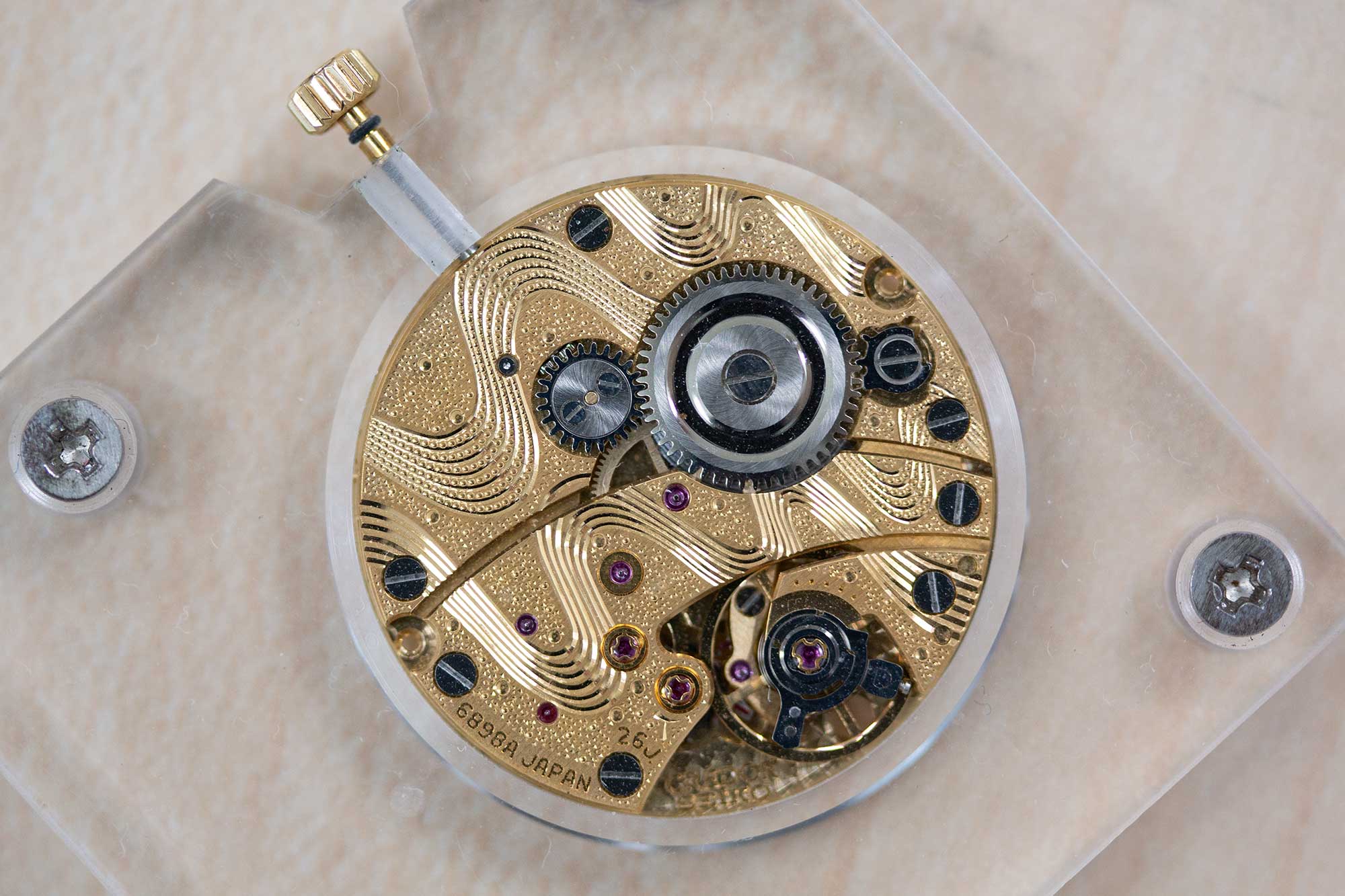 An ornate, hand-engraved caliber.
