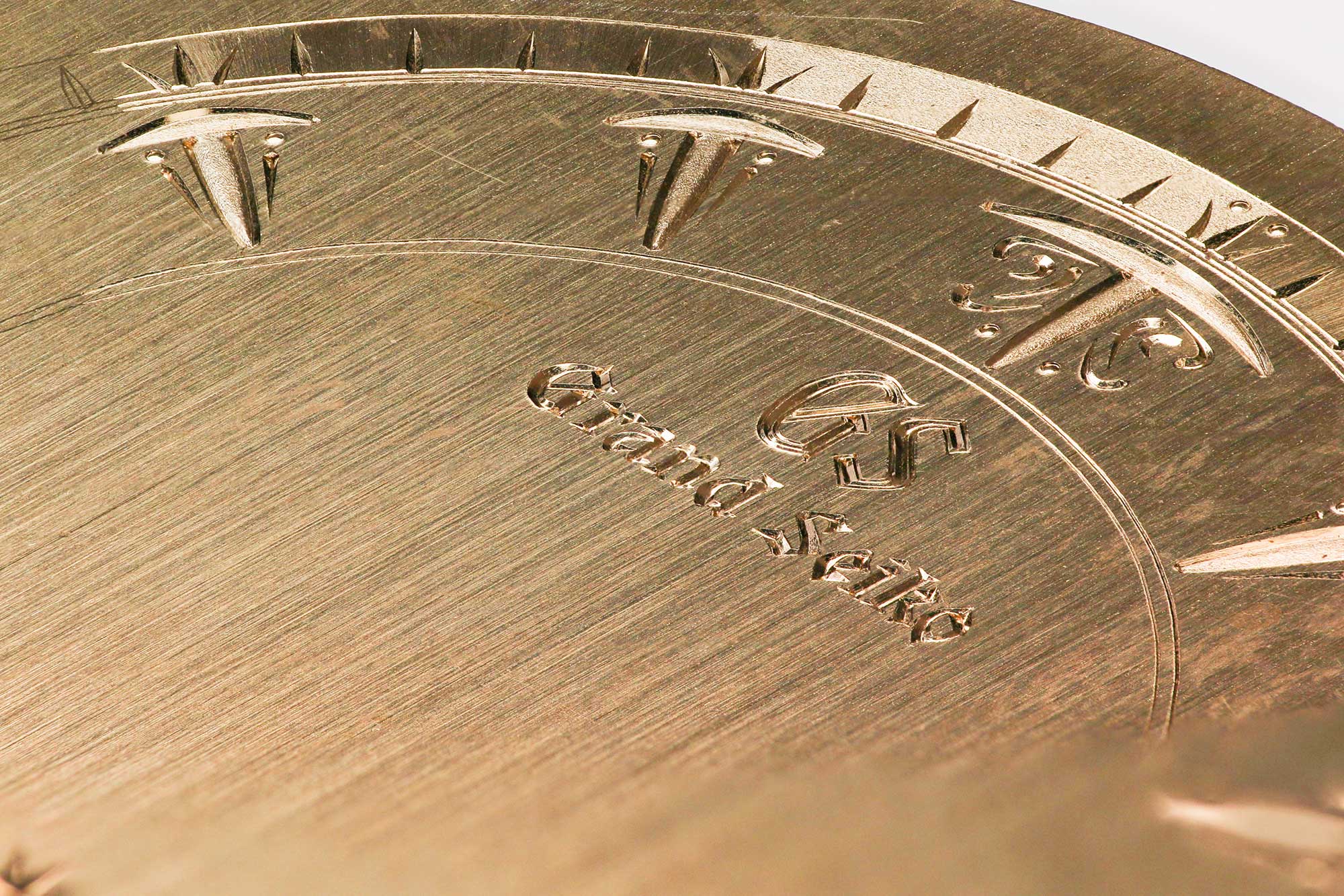 Hand engraving work on a sample dial.