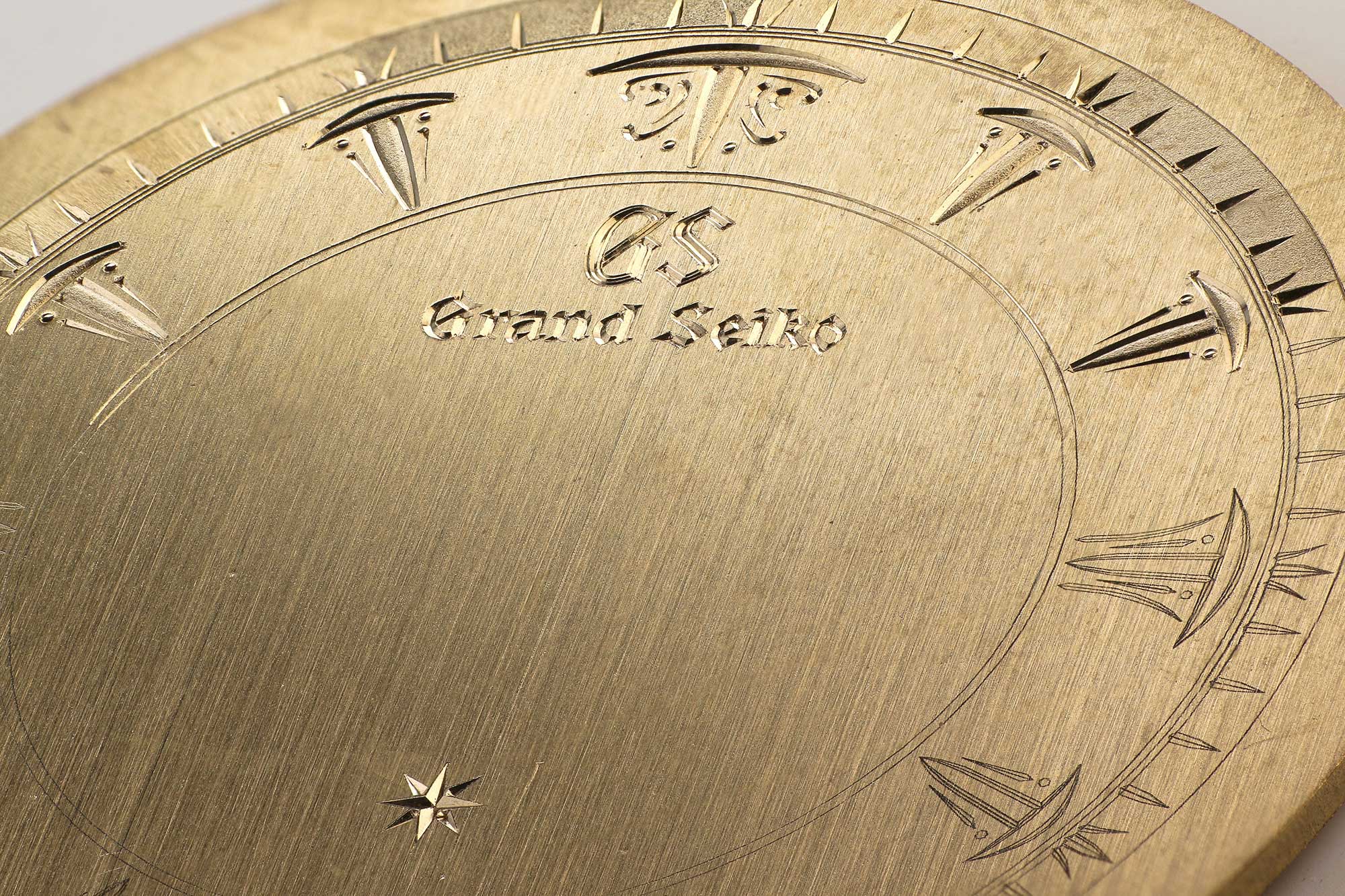 Hand engraving work on a sample dial.