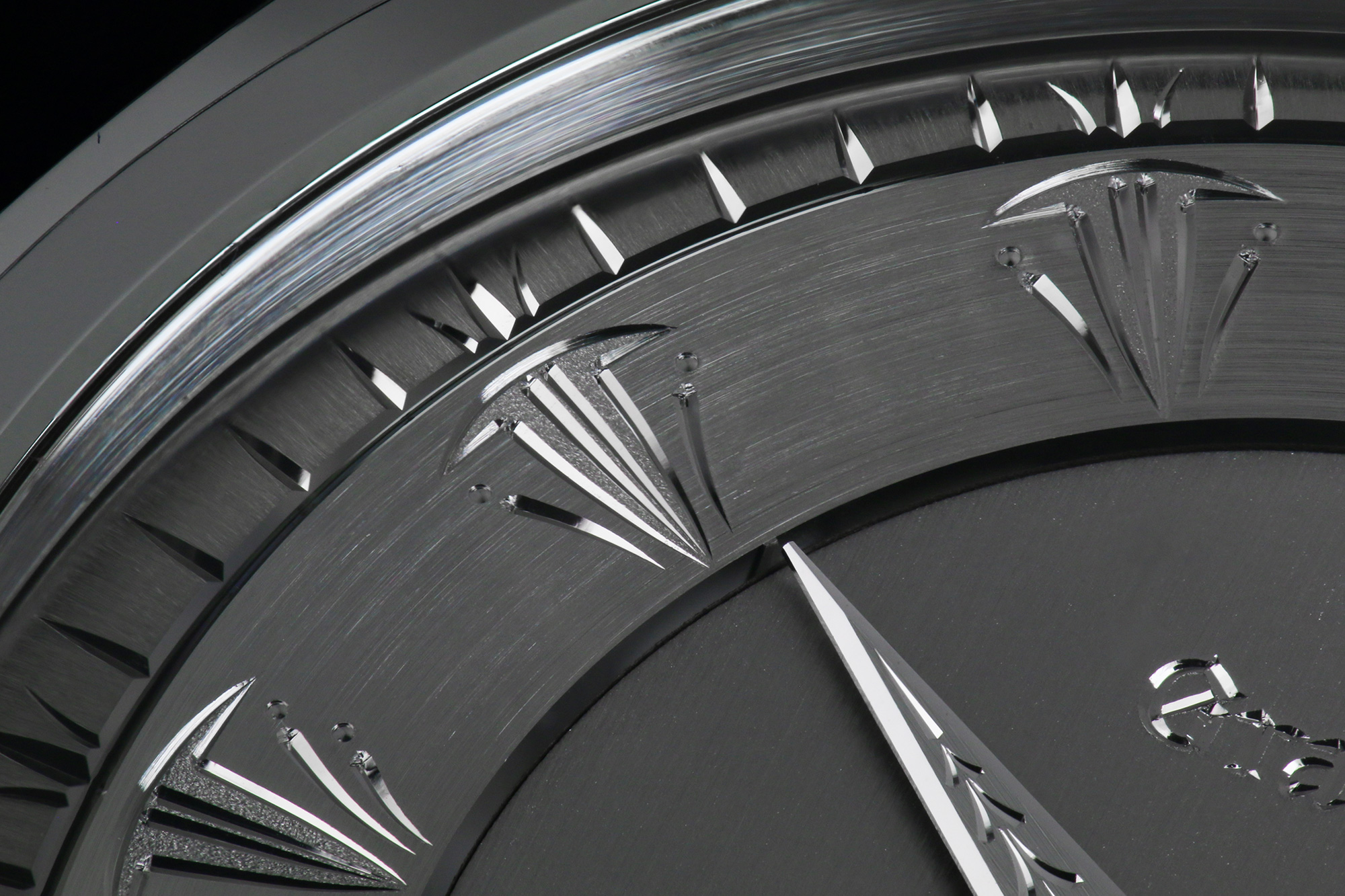 A closeup of the hand engraving work on the dial of Grand Seiko SBGW263.