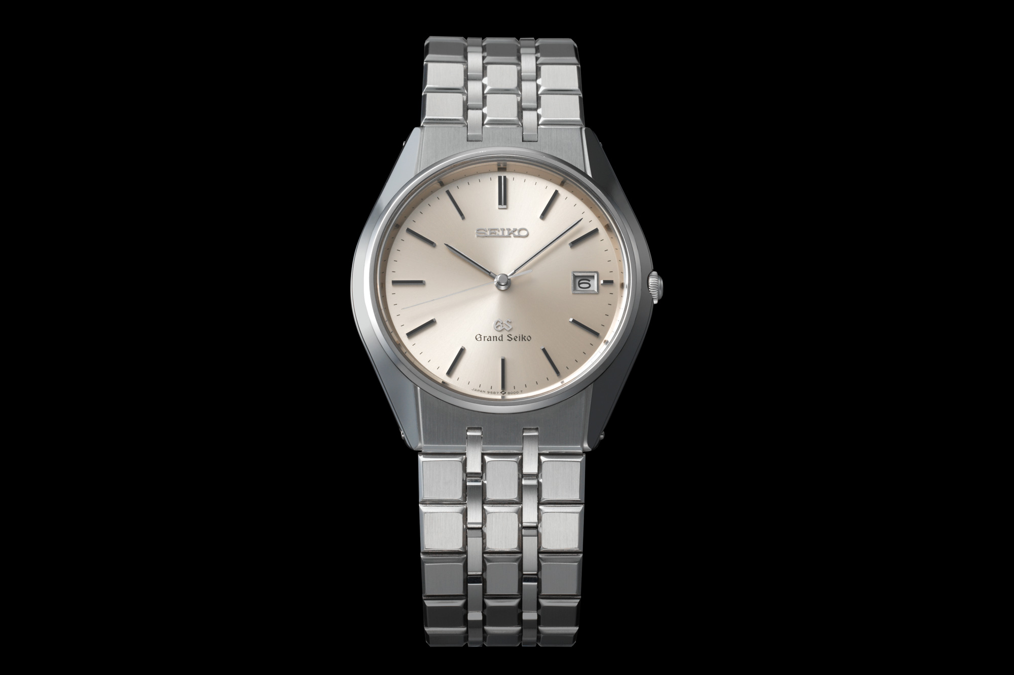 95GS wristwatch against black backdrop.